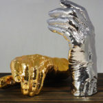 <p><strong>Luigi Colani, epoxy – cast, chrome optics gold/silver<br />
</strong></p>
