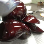 <p><strong>Ulrike Buhl, sculpture, real carbon, tinted red, sealed with clear coat, mirror polished</strong></p>
