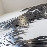 <p><strong>Coating: 2-coloured paint black/white, clear coat seal matt</strong><br />
Dorthe Goden, laser cuts from 2 mm sheet steel, Kunst am Bau, Justice Center Bad Kreuznach, 2. OG / 3. OG, 2017<br />
Photo by: Thorsten Arendt</p>
